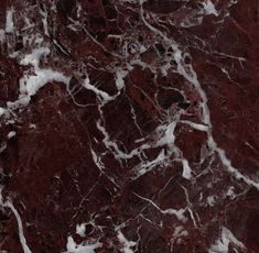 red marble with white streaks on it