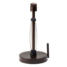 a black and brown table lamp sitting on top of a wooden stand