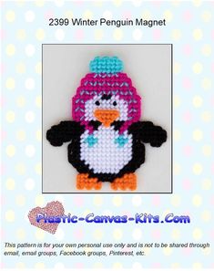 the penguin is wearing a pink and blue knitted hat