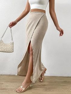 This versatile Knit Ribbed Khaki Wrap Maxi Skirt provides a classic yet sophisticated style. The ribbed knit fabric ensures a comfortable and secure fit, perfect for day or evening wear. With a classic wrap design, this skirt is perfect for creating a polished look. 53% Polyester,44% Viscose,3% Spandex Imported Pull On closure Hand Wash Only Brand Size Dress Bust Waist Hip XS 0-2 31-32.5'' 23-24'' 31-34" S 4-6 33-35'' 25-26'' 35-37" M 6-12 35-36'' 27-28'' 38-39" L 12-14 38-40'' 29-31'' 40-42" XL 14-16 40-42'' 33.5-36'' 44-46" Wrap Maxi Skirt, Winter Knit Hats, Winter Knits, Sophisticated Style, Sunglass Frames, Polished Look, Evening Wear, Knitted Hats, Ribbed Knit