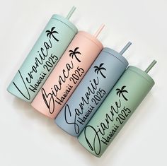 four different colored tumblers with names on them