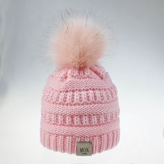 Keep your little one's noggin warm and looking sweet with this knitted wool hat! It's the perfect size and thickness for children aged 1 to 7, and with so many colors to choose from, they're sure to find one they love! So, if you can't get 'em to wear a scarf, keep their head covered with this cozy beanie – warm and stylish, what more could they want? Cute Soft Pink Hat, Cute Warm Beanie, One Size Fits Most, Cute Warm Beanie One Size Fits Most, Cute Warm Beanie One Size, Cute Soft Knit Winter Hats, Cute Warm One-size Beanie, Cute Warm Winter Beanie, Cute Warm Beanie, Cute One-size Beanie