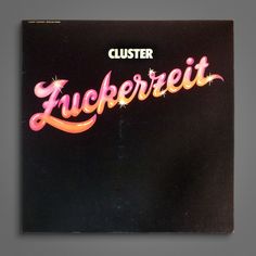 an album cover with the word lucker written in pink and orange letters on it