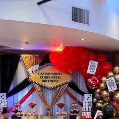 a casino themed birthday party with balloons and decorations