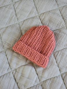 Keep your tiny one cozy with this handmade crochet baby hat, designed for preemie and newborn babies. This soft pink beanie is carefully crocheted and features a foldable trim, allowing for a snug fit and extra warmth. The stretchy design ensures comfort, making it perfect for those first few months. The foldable trim also provides room for growth, ensuring your baby can wear it for longer. Hat Details: Size: Fits preemie to newborn babies Dimensions: 6.5 inches tall, 13-inch circumference at th Pink Beanie, Crochet Baby Hat, Pink Beanies, Soft Pink Color, Newborn Babies, Crochet Baby Hats, Gifts For New Parents, Baby Hat, Practical Gifts