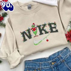 Grinch Christmas Snow Vintage Grinch Christmas Embroidered Shirt Introducing our Embroidered Sweatshirts – the perfect fusion of comfort and style. Crafted from premium, soft cotton-blend fabric, these sweatshirts are designed to keep you cozy while making a fashion statement. Each piece features intricate embroidery that adds a touch of elegance and individuality, elevating the classic... Vintage Grinch, Nike Christmas, Christmas Sweatshirt Ideas, Grinch Stuff, Preppy Christmas, Cute Shirt Designs, School Looks, Grinch Christmas, Christmas Hoodies