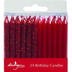 red candles with glitter on them in a package