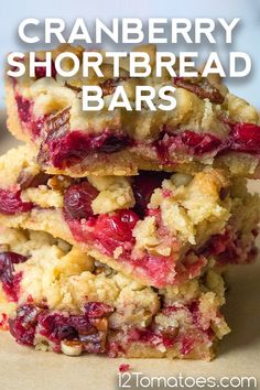 cranberry shortbread bars stacked on top of each other with text overlay