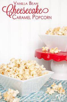 vanilla bean cheesecake caramel popcorn in two bowls on a blue and white tablecloth