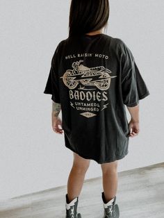 These tees are printed on super soft Comfort Colors, providing a relaxed unisex fit with a worn-in look and feel. This collection offers our most expanded size range from S-3X.Looking for these tees to fit oversized? Size up 1-2 sizes.Model is wearing a size 2X for an oversized fit• 100% ring-spun cotton• Garment-dyed• Relaxed fitThis product is made especially for you as soon as you place an order, please see the banner on the top of our site for current turnaround times. Making products on dem Vinyl Graphic Tees, Acid Wash T-shirt With Text Print, Cotton Biker T-shirt With Letter Print, Acid Wash T-shirt With Front Print And Crew Neck, Oversized Washed Black T-shirt With Screen Print, Acid Wash Short Sleeve T-shirt With Text Print, Acid Wash Graphic Tee With Short Sleeves, Relaxed Fit Washed Black T-shirt With Screen Print, Acid Wash Short Sleeve Graphic Tee