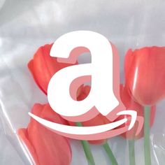 an amazon ad with flowers in front of it and the letter'a'on top