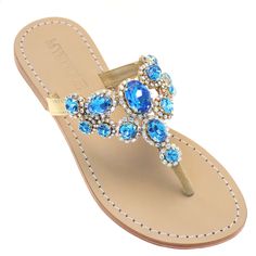 Nothing screams luxe like the Cape Town thong sandal. The aqua colored stones and gold detailing will make you feel royal. split Hand-Made & Made to Order (2-3 weeks) 100% Leather Sole Lined with Suede For Added Comfort Embellished with Czech Crystals & Rhinestone Chain ½ Inch Heel Use Our “Add A Wedge” Button To Add A Wedge To This Sandal Changing From A Flat To A Wedge Will Make Your Order Final Sale Made in Bali, Shipped From Los Angeles Mystique Sandals, Leather Sandals Handmade, Crystal Sandals, Shoes Design, Rhinestone Chain, Wedges Style, Colored Stones, Embellished Sandals, Blue Flats