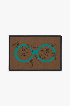 a door mat with glasses drawn on it