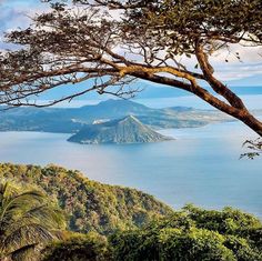 a view of the ocean and mountains from a hill top in costa rica, brazil