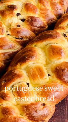 a close up of bread on a wooden table with the words portuguese sweet easter bread