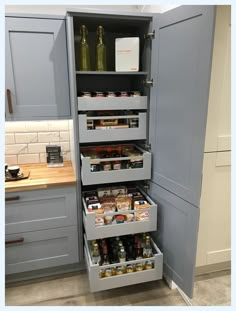 an open pantry with lots of food in it