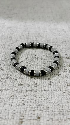 Men's bracelet, with black and grey clay beads and silver flat bead Wrist size 6.5 Seed Bead Bracelets For Guys, Clay Bracelet For Men, Guy Beaded Bracelets, Men’s Bead Bracelets, Mens Bracelet Beads, Men's Beaded Bracelets, Clay Bead Bracelet Ideas For Men, Diy Bracelet Men, Men Beads Bracelet