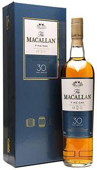 the macallan 30 year old single cask is in front of a box