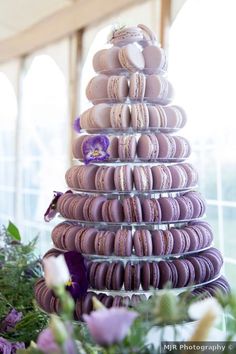 there is a tall tower made out of macaroons