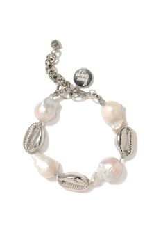 Indulge in the beauty of our Ocean Dream Bracelet! Made with silver plated brass, this bracelet features baroque pearls and shells, evoking the magic of the ocean. The perfect accessory for any dreamer (or beach lover) looking to add a touch of glam to their outfit. 6" Baroque pearl bracelet 1.5" extension Lobster clasp closure Silver plated brass hardware and shell charms Mermaid Core Bracelet, Dream Bracelet, Bracelet In Silver, Fall Wardrobe Essentials, Beach Lover, Hair Rings, Fragrance Gift Set, Baby Boy Shoes, Bracelet Silver