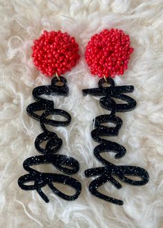 These spirit earrings are the perfect accessory for game day. They measure approximately 1" x 3.5". The dangled part is made of glittered acrylic. So super cute! Cheer Hair Bows, Cheer Hair, Preppy Jewelry, Nc State, Earrings Beaded, Wolf Pack, Red Earrings, Earrings Black, Car Charms