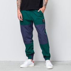 Adidas Retro Green Joggers With Navy And Red Details Worn Once Green Athleisure Bottoms For Outdoor, Casual Green Nylon Pants, Urban Style Blue Long Pants, Green Nylon Long Pants, Green Cotton Cargo Pants For Sports, Casual Green Parachute Pants For Sports, Casual Blue Parachute Trousers, Spring Sportswear Trousers, Blue Sporty Pants With Hip Pockets