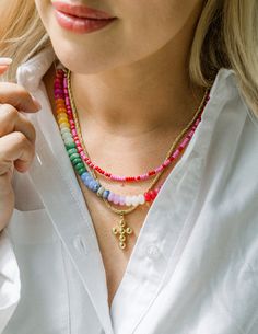 Limited Edition Necklace Petite, but playful. This necklace is a perfect sprinkle of pink and red! Co-designed with influencer and Living Fully founder, Mallory Ervin, this piece instantly elevates a look. Be sure to follow Mallory, @malloryervin! 4mm red and pink seed bead water resistant and sweat proof Playful Pink Jewelry With Beaded Chain, Everyday Pink Necklaces With Letter Beads, Playful Pink Beaded Chain Jewelry, Playful Pink Necklace For Everyday, Trendy Red Beaded Necklace For Party, Trendy Pink Necklace With Tiny Beads, Trendy Red Necklaces With Round Beads, Trendy Red Round Bead Necklaces, Trendy Pink Necklace With Letter Beads