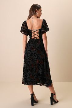 Your new favorite way to look flawless will be by wearing the Lulus Lovely Purpose Black Velvet Floral Burnout Lace-Up Midi Dress! A burnout velvet floral design decorates a sheer mesh overlay (atop a matching knit liner) that shapes a princess-seamed bodice, subtle sweetheart neckline, and flouncy flutter sleeves (with elastic at the shoulders). The high, fitted wait tops an A-line skirt that falls to breezy midi hem. A trendy lace-up design secures atop the open back for a flirty finish! Hidde Burnout Velvet, Lulu Fashion, Black Fishnets, Wedding Guest Dresses, Mesh Overlay, Long Sleeve Mini, Flutter Sleeves, Dress Romper, Wedding Trends