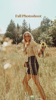 a woman walking through tall grass holding a sunflower in her hand and the words fall photoshoot above her