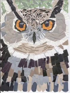 an owl is made up of many different pieces of mosaic glass and wood, with orange eyes