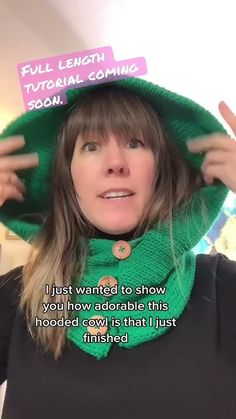 a woman wearing a green hat and scarf over her head with the words, full length natural coming soon i just want to show you how adorable this hood cowl