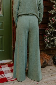 - These cozy pants have a luxe vibe! - Unlined ultra-soft stretchy material with a ribbed texture - A wide waistline - A relaxed yet flattering silhouette that ends in floor length hemlines Measurements S : Hip 34", Length 40.5", Waist 24". M : Hip 36", Length 41.5", Waist 26". L : Hip 38", Length 42", Waist 28". Comfy Wide-leg Pants With Ribbed Waistband, Relaxed Fit High-waisted Wide Leg Pants With Ribbed Waistband, Cozy Full-length Bottoms With Ribbed Waistband, Green Relaxed-fit Pants With Ribbed Cuffs, Green Corduroy Full-length Bottoms, Cozy Pants, Hunter Green, Stretchy Material, Floor Length