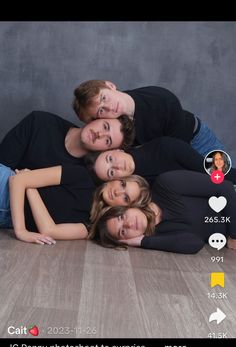 a group of people laying on top of each other