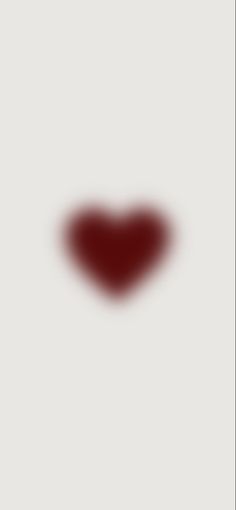 a heart shaped object is shown in the middle of a white background with red spots