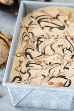 an ice cream sundae with peanut butter and chocolate drizzle