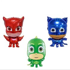 three foil balloons in the shape of superheros and spiderman faces, each with different colors