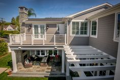 an aerial view of a house with stairs leading up to the upper floor and second story