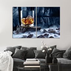 two canvases with an image of a glass of whiskey and ice on the rocks