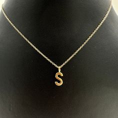 14k Yellow Gold initial Letter S 8mm (JR 3mm) Metal - 14k Yellow Gold Gross wt: 0.318 gm Length : 8mm Width : 3mm All weight and dimensions are approximate. It varies every time we produce it. ➡️MAAHIRA'S JEWELRY:  Elevate your style with our stunning 14k & 18k gold diamond jewelry collection.  ➡️PERFECT EVERYDAYWEAR ACCESSORY: A must-have piece for everyday life, It will give your outfit an air of elegance and go well with any ensemble, day or night, for work, holiday, or a party.  ➡️PERFECT GIFT IDEAS: From earrings, minimalist charm & pendants to intricate necklaces and elegant bracelets, our collection offers a diverse range of designs to suit every taste and style. Ideal gift for your sister, daughter, mother, wife, niece, aunt, best friend, girlfriend or yourself!  ➡️METAL: Our Jewel Gold Classic Initial Necklace With Charms, School Starts, Gold Chain Design, Friend Girlfriend, Gifts For Your Sister, Daughter Mother, Gold Letter, Gold Diamond Jewelry, Elegant Bracelet