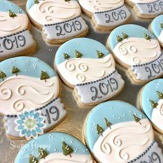 some decorated cookies are on a tray