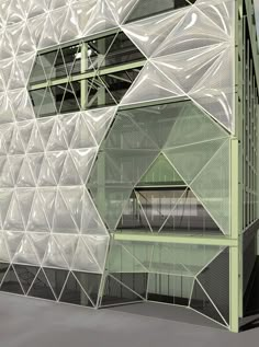 an architectural rendering of a building made out of white plastic and green metal mesh panels