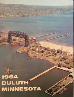 an aerial view of a bridge over the water