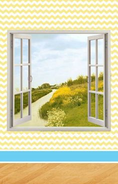 an open window with a view of a country road and yellow flowers on the grass