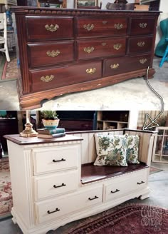 an old dresser has been transformed into a bench