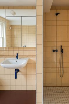 the bathroom is clean and ready to be used as a shower stall or sink area