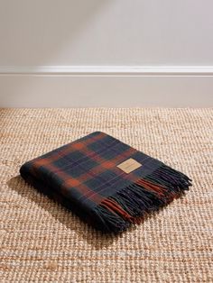 A soft throw is a year-round essential, whether you're bundling up in the winter or using it as a picnic blanket in the summer. Inspired by 20th century steamer rugs, Pendleton's 'Motor Robe' style is woven from pure wool patterned with a classic 'Jacksonville Plaid' and finished with fringing at the edges. It comes with a leather carrier, so you can get it around easily. Blanket Mens, District Vision, Ralph Lauren Shop, Pendleton Blanket, White Shoes Sneakers, Common Projects, Luxury Sneakers, Wool Throw, Classic Sneakers