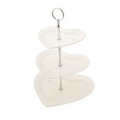 three tiered cake plate holder with ring on the top and bottom, set against a white background