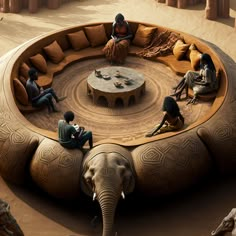 several people sitting around an elephant shaped table