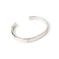 In the world of cuffs, you don't get much better than the Olivia Bracelet. With a thicker, statement feel and a beautifully crushed silver texture, this cuff creates a stand out style you will want to show off again and again!  Rhodium Plating Stainless Steel E-coating for a premium finish Lead & Nickel Free Malleable for Adjustable fit CARING FOR YOUR AOE JEWELS  At Arms Of Eve, we take great pride in the quality of all our jewels. All of our pieces are suitable for daily wear. Our jewels are 1 Olivia Bracelet, Silver Arm Cuff, Silver Texture, Arm Cuff, Again And Again, A Stand, Silver Cuff Bracelet, Silver Cuff, Bag Straps