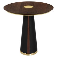 a wooden table with black and gold accents